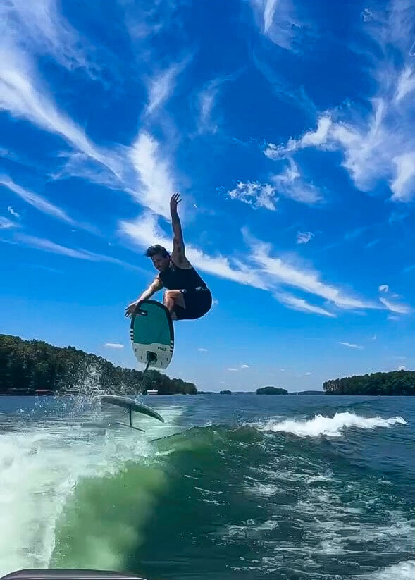 Wake surfing on Lake Lanier during early morning and late afternoon for best conditions